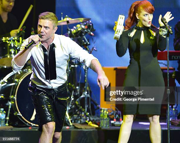 Jake Shears and Ana Matronic of Scissor Sisters perform at Fashion Cares: A Night Of Glitter & Light Featuring Elton John - Show at Sony Centre For...