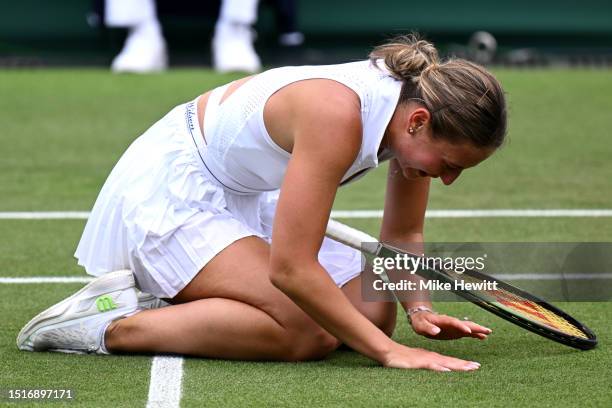 Marta Kostyuk of Ukraine celebrates winning match point against Maria Sakkari of Greece in the Women's Singles first round match during day three of...