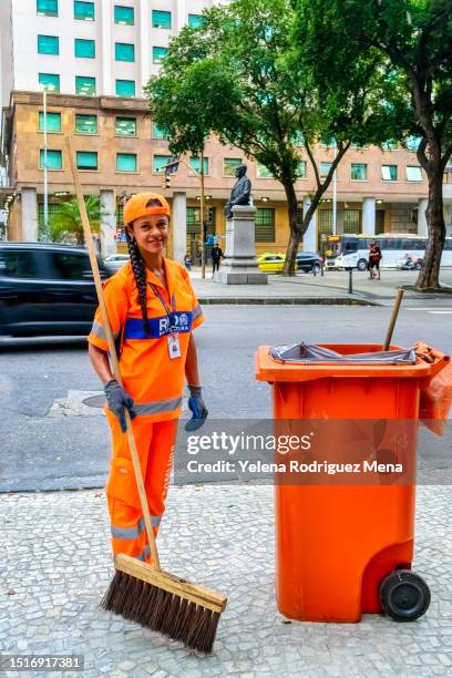 female blue collar worker - street sweeper stock pictures, royalty-free photos & images
