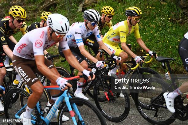 Nathan Van Hooydonck of Belgium and Team Jumbo-Visma, Tadej Pogacar of Slovenia and UAE Team Emirates - White best young jersey and Adam Yates of...