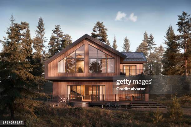 rendering 3d della casa forestale durante il tramonto - chalet foto e immagini stock