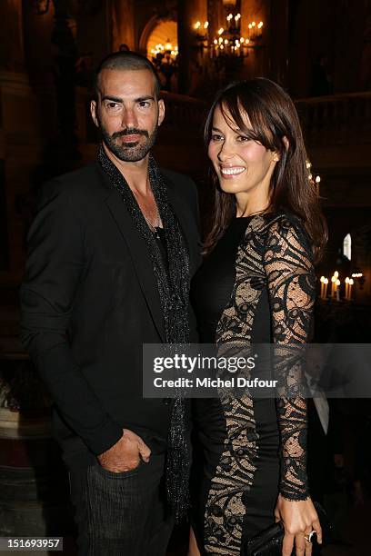Stany Coppet and Dolores Chaplin attend the George Michael Performing For Symphonica to the benefit of the French Sidaction-Arrivals at palais...