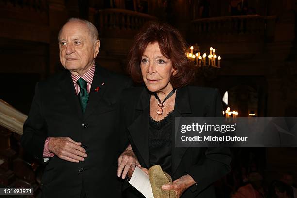 Pierre Berge and Charlotte Aillaud attend the George Michael Performing For Symphonica to the benefit of the French Sidaction-Arrivals at palais...