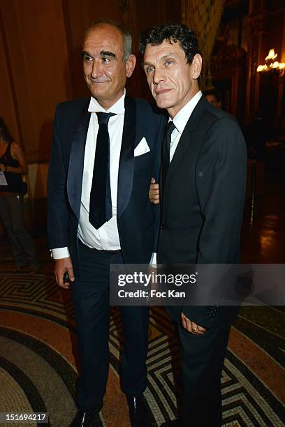 Pascal Negre and Marc Lavoine pose during the 'Symphonia' Georges Michael Concert in Benefit of Sidaction at the Opera Garnier - Arrivals on...