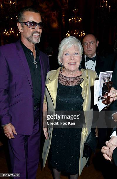 George Michael and Line Renaud pose during the 'Symphonia' Georges Michael Concert in Benefit of Sidaction at the Opera Garnier - Arrivals on...