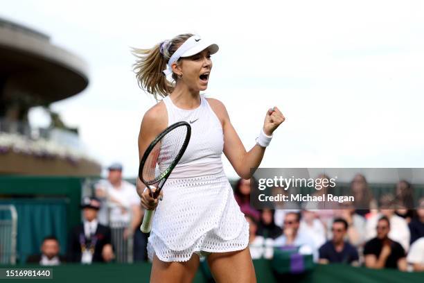 Katie Boulter of Great Britain celebrates winning match point against Daria Saville of Australia in the Women's Singles first round match during day...