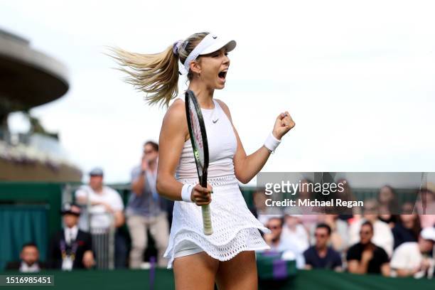 Katie Boulter of Great Britain celebrates winning match point against Daria Saville of Australia in the Women's Singles first round match during day...