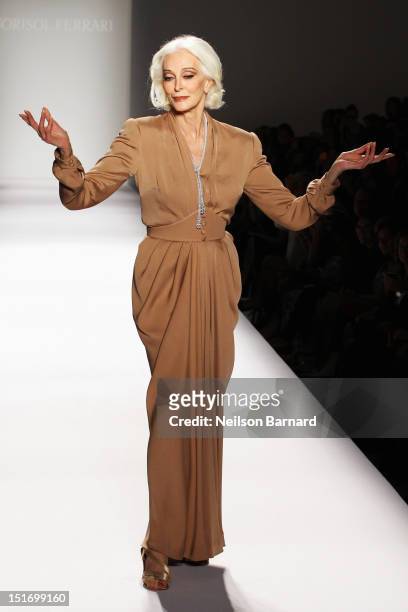 Model Carmen Dell'Orefice walks the runway at the Norisol Ferrari Spring 2013 fashion show during Mercedes-Benz Fashion Week at The Studio at Lincoln...