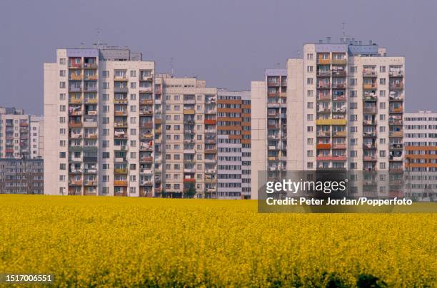 View of apartments in high rise towers and blocks of flats within a housing estate in a suburb of the city of Katowice in Silesia Province of...