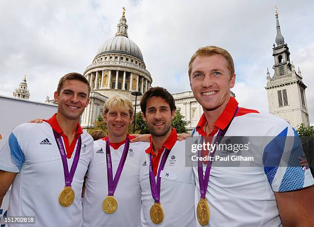 Gold medal winners Alex Gregory, Pete Reed, Tom James and Andrew Triggs-Hodge of the Great Britain men's coxless four rowing team take part in the...