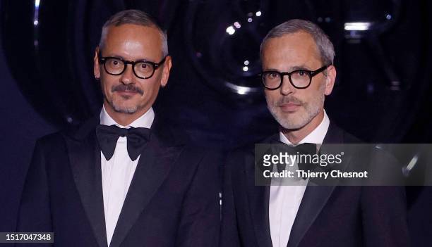 Dutch designers Viktor Horsting and Rolf Snoeren greet the audience after the Viktor & Rolf Haute Couture Fall/Winter 2023/2024 show as part of Paris...
