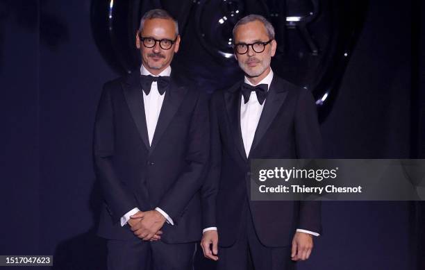 Dutch designers Viktor Horsting and Rolf Snoeren greet the audience after the Viktor & Rolf Haute Couture Fall/Winter 2023/2024 show as part of Paris...