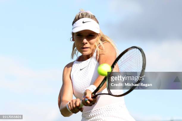 Katie Boulter of Great Britain plays a backhand against Daria Saville of Australia in the Women's Singles first round match during day three of The...