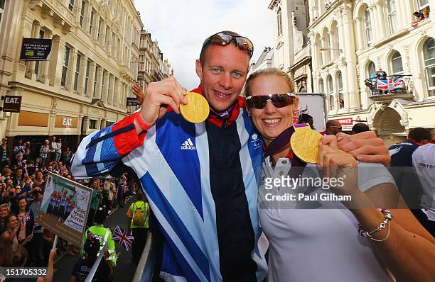 Paralympics GB gold medallists in the Mixed Coxed Four Rowing - LTAMix4+ David Smith and Naomi Riches take part in the London 2012 Victory Parade for...