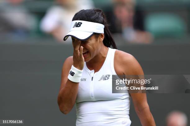 Heather Watson of Great Britain reacts against Barbora Krejcikova of Czech Republic in the Women's Singles first round match during day three of The...