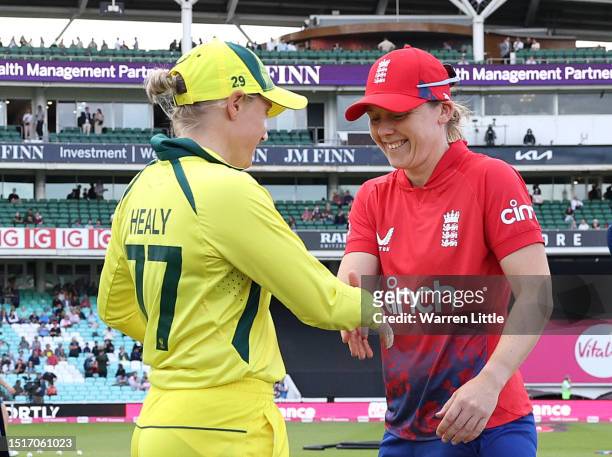 Captains, Alyssa Healy of Australia and Heather Knight of England perform the coin toss ahead of the Women's Ashes 2nd Vitality IT20 match between...