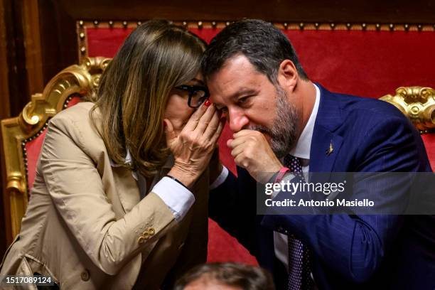 Italian Tourism Minister Daniela Santanche speaks with Italian Minister of Infrastructure and Transport Matteo Salvini as she reports to the Italian...