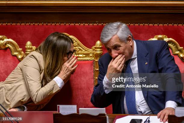 Italian Tourism Minister Daniela Santanche speaks with Italian Minister of Foreign Affairs and deputy Prime Minister Antonio Tajani as she reports to...