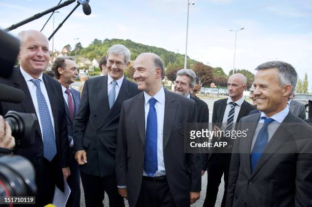 French Philippe Varin , chairman of managing board of French car maker PSA Peugeot Citroen, French Economy, Finance and Foreign Trade Minister Pierre...