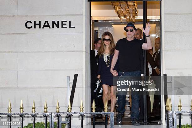 Actor John Travolta and his wife Kelly Preston are seen at the 'Chanel' store on September 10, 2012 in Paris, France.