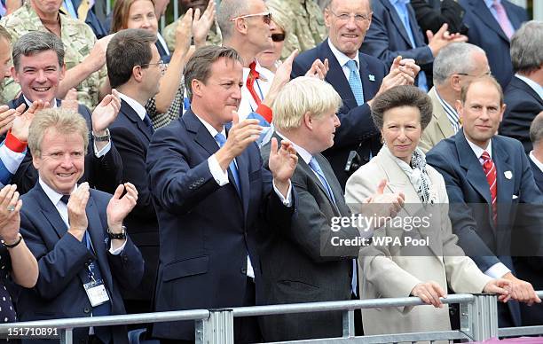 Prime Minister David Cameron, Mayor of London Boris Johnson, Princess Anne, Princess Royal and Prince Edward, Earl of Wessex cheer on the athletes as...