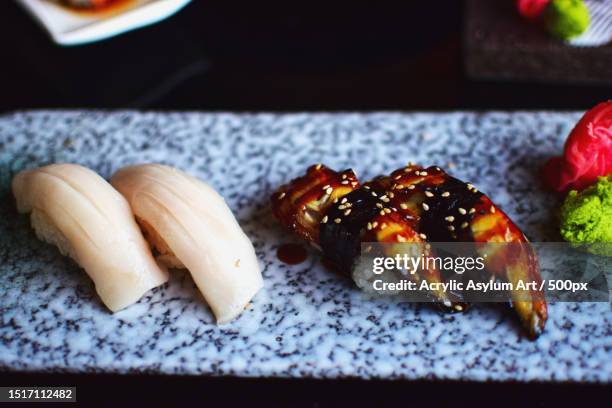 close-up of sushi served in plate,united states,usa - raw acrylic stock pictures, royalty-free photos & images