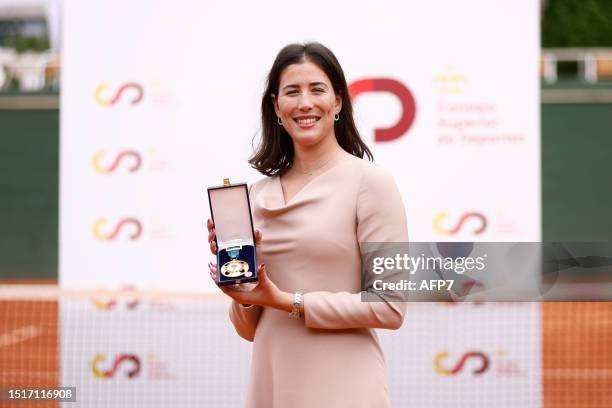 Garbine Muguruza poses for photo during the award ceremony of the Gold Medal for Sports Merit awarded to Garbine Muguruza at the Chamarti Tennis Club...