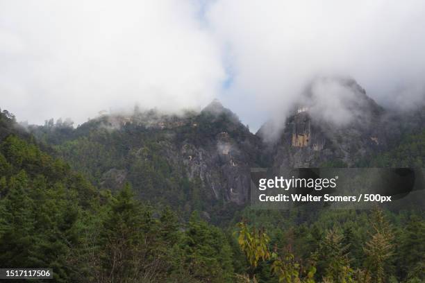 scenic view of mountains against sky - disparo bildbanksfoton och bilder