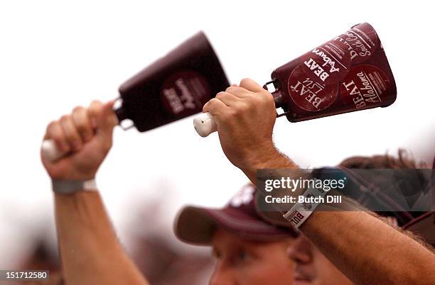 Mississippi State fans wave cowbells in the first quarter of a NCAA college football game against Auburn on September 8, 2012 at Davis Wade Stadium...