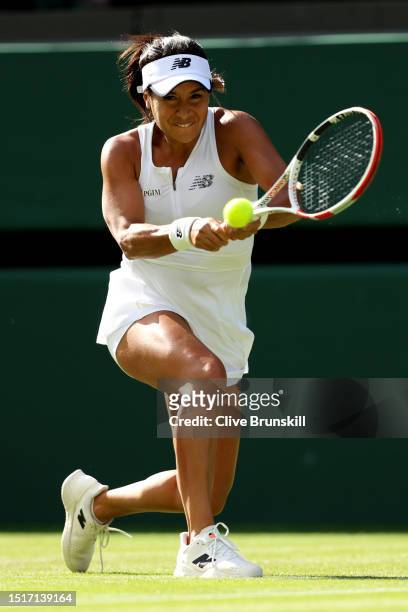 Heather Watson of Great Britain plays a backhand against Barbora Krejcikova of Czech Republic in the Women's Singles first round match during day...