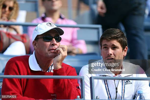 Coach Ivan Lendl and Daniel Vallverdu watch Andy Murray of Great Britain during his men's singles final match against Novak Djokovic of Serbia on Day...