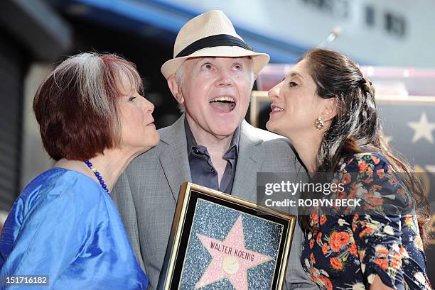 Actor Walter Koenig poses with his wife Judy Levitt and daughter Danielle on his star on the Hollywood Walk of Fame in Hollywood, California, on...
