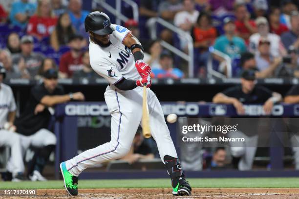 Bryan De La Cruz of the Miami Marlins hits a solo home run against the Philadelphia Phillies during the third inning at loanDepot park on July 9,...