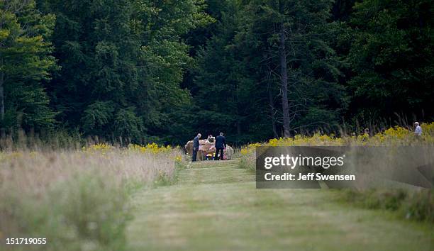 Secretary of Defense Leon Panetta tours the Flight 93 National Memorial with Families of Flight 93 President Patrick White during ceremonies...