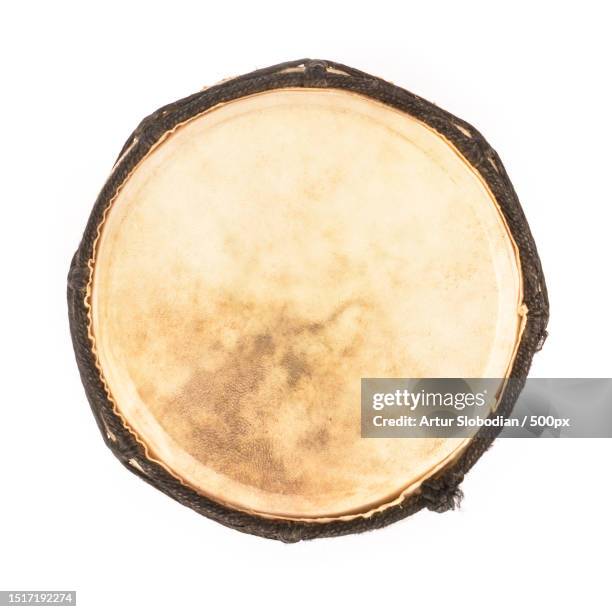 close-up of drum against white background - djembe foto e immagini stock