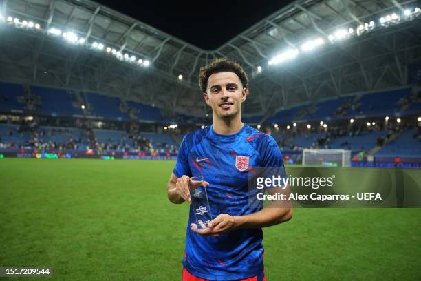 Curtis Jones of England poses for a photo with the Player of the Match Trophy following the UEFA Under-21 Euro 2023 Semi Final match between Israel...