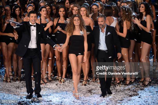 Newly elected 19-year-old Giusy Buscemi is crowned with the title of Miss Italia 2012, Fabrizio Frizzi and Beppe Fiorello attend the final of the...