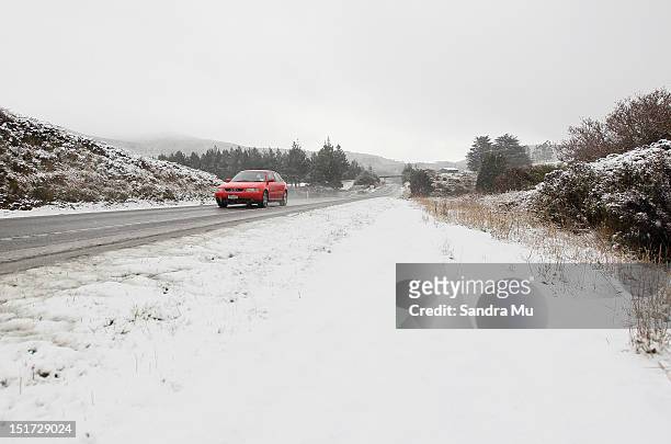 State Highway One leading into Dunedin where snow is falling in Dunedin due to a cold front hitting the lower South Island on September 11, 2012 in...