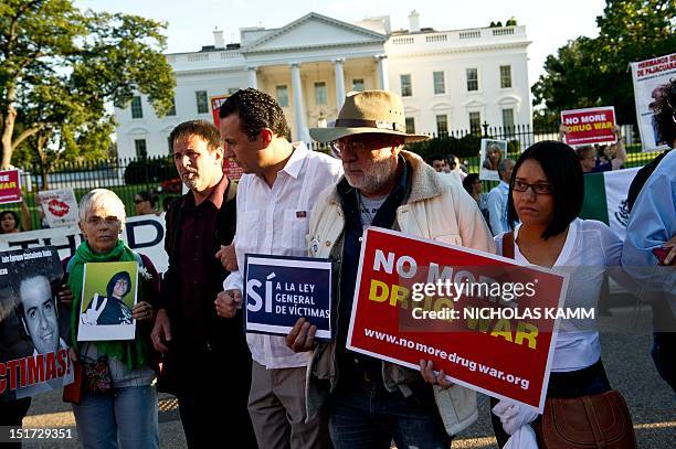 Protestors chant march in front of the White House in Washington on September 10, 2012 during the "Caravan for Peace," across the United States, a...