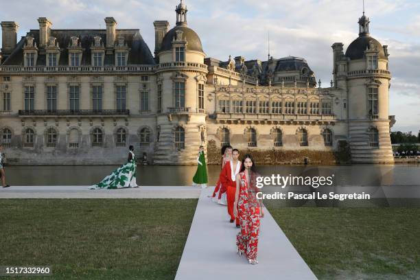 Models walk the runway during the Valentino Haute Couture Fall/Winter 2023/2024 show as part of Paris Fashion Week at Chateau de Chantilly on July...