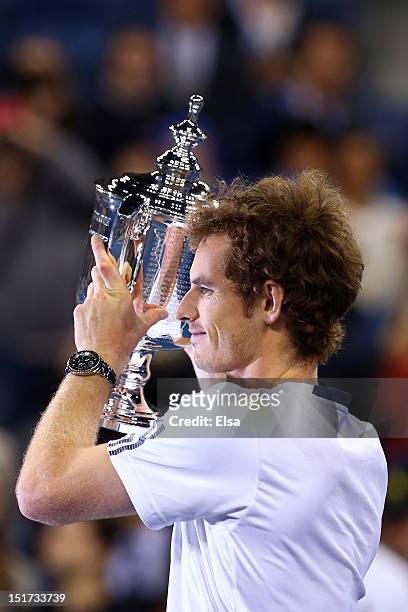 Andy Murray of Great Britain lifts the US Open championship trophy after defeating Novak Djokovic of Serbia in the men's singles final match on Day...
