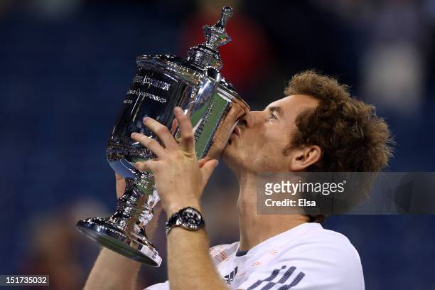 Andy Murray of Great Britain kisses the US Open championship trophy after defeating Novak Djokovic of Serbia in the men's singles final match on Day...