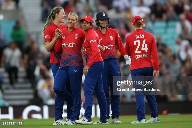 Danielle Gibson of England celebrates taking the wicket of Beth Mooney of Australia with Danni Wyatt during the Women's Ashes 2nd Vitality IT20 match...