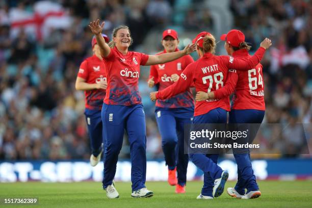 Danielle Gibson of England celebrates taking the wicket of Beth Mooney of Australia with Danni Wyatt during the Women's Ashes 2nd Vitality IT20 match...