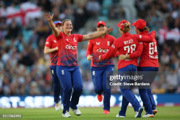 Danielle Gibson of England celebrates taking the wicket of Beth Mooney of Australia with Danni Wyatt during the Women's Ashes 2nd Vitality IT20 match...