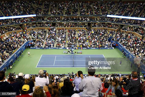 The crowd cheers as the men's single final match between Andy Murray of Great Britain's and Novak Djokovic of Serbia approaches its conclusion in the...