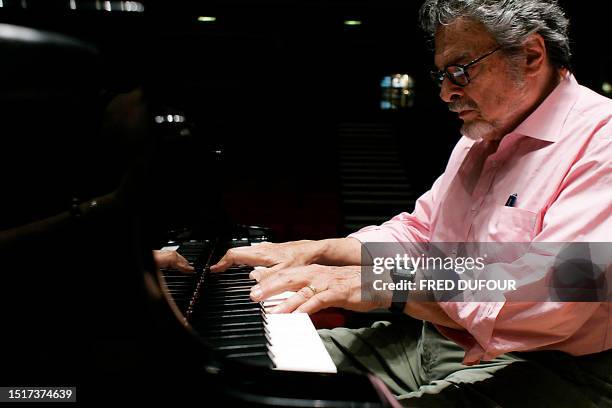 American pianist and conductor Leon Fleischer rehearses 14 June 2006 in Maison de la Radio in Paris. He was born in San Francisco, California, where...