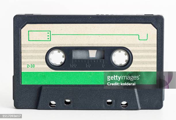 audio cassette on white background - tape stockfoto's en -beelden