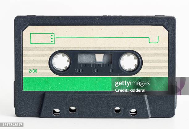 audio cassette on white background - cassette tape stock pictures, royalty-free photos & images