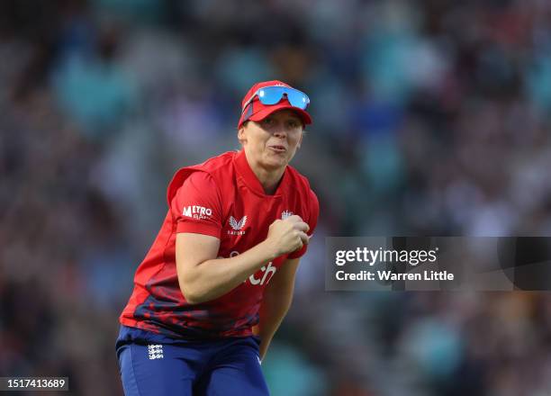 Heather Knight, Captain of England celebrates catching Annabel Sutherland of Asutralia off the bowling of Sarah Glenn of England during the Women's...